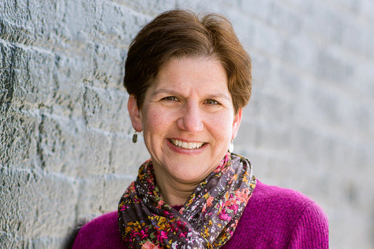 Photo of Naomi Braun celebrating and loving being 50+