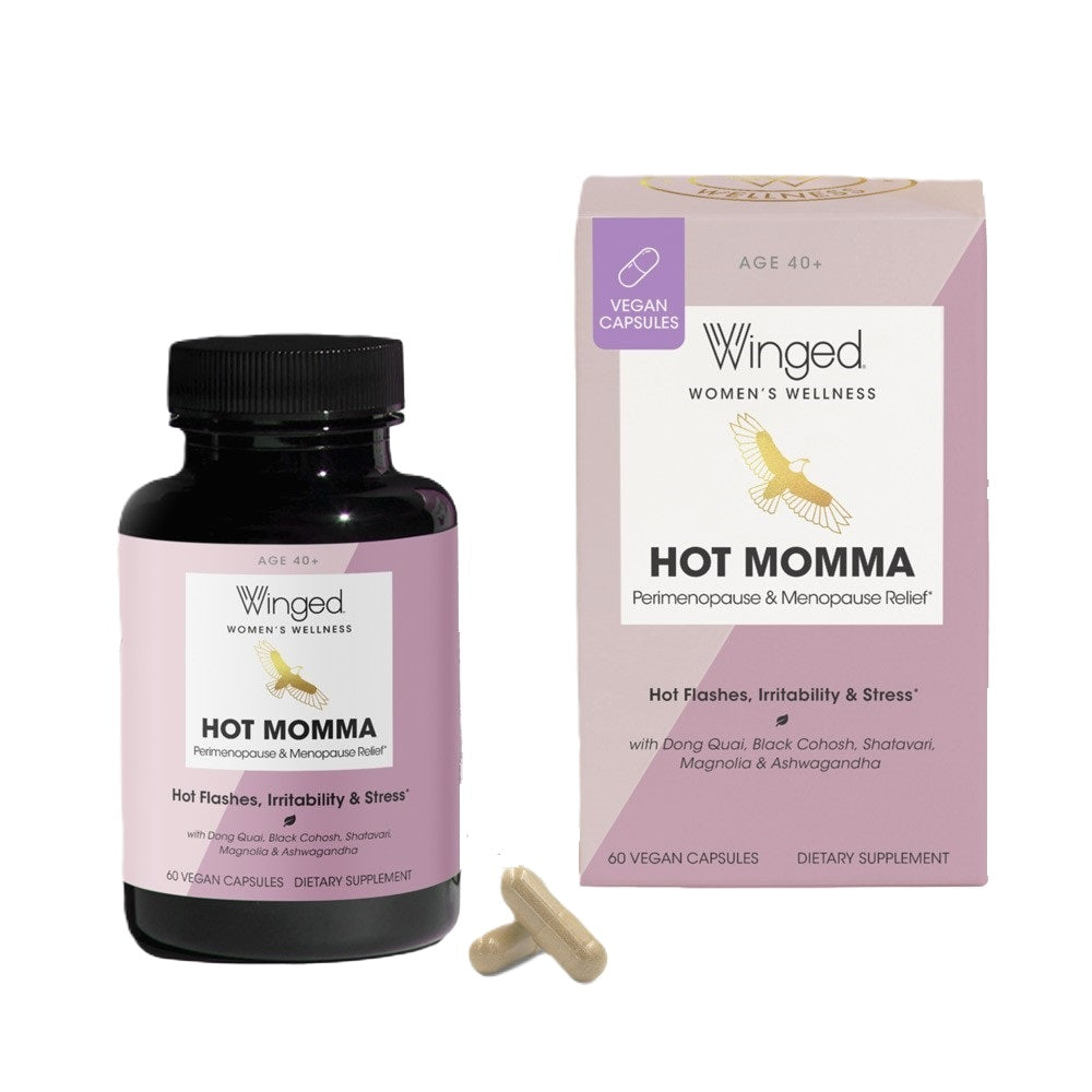 A container of Hot Momma Menopause Support Supplements placed next to its box and two supplement capsules, aimed at supporting women through menopause with a focus on hot flashes, irritability, and stress.