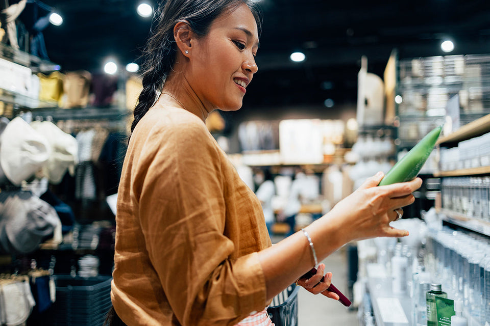 woman in perimenopause shopping for clean products for her changing menopausal skin