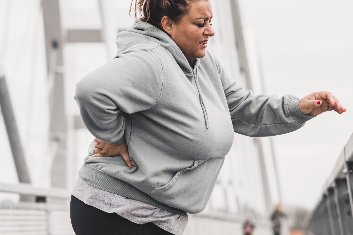 Woman going for a walk and experiencing menopause hip pain