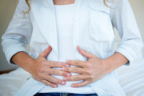 Tame your perimenopause belly bloat by learning simple tips from Versalie