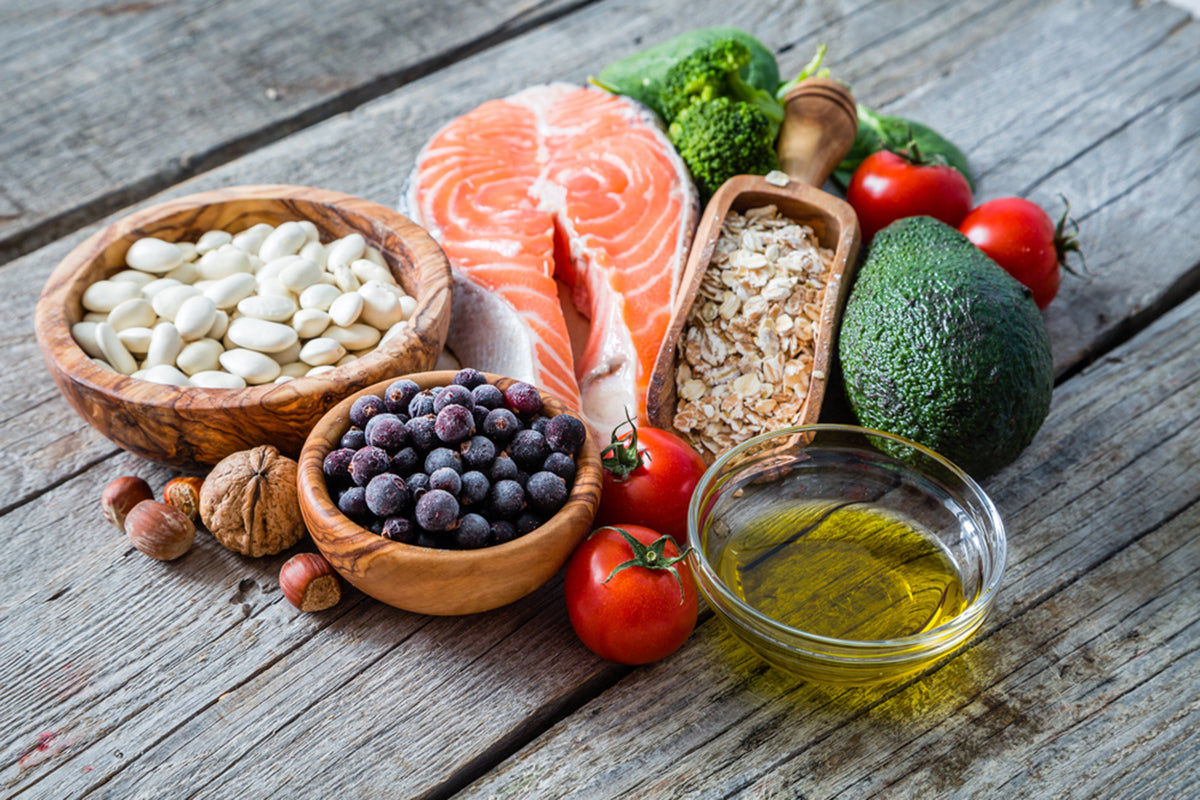 Foods commonly associated with the Mediterranean diet have been shown to be beneficial for managing hot flashes, sleep disturbances, and other common menopause symptoms. Examples include salmon, beans, and olive oil.