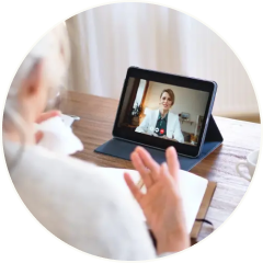 a postmenopausal woman meeting her menopause-trained clinician from the comfort of her home to represent CARE